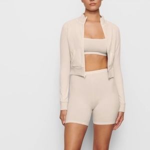 SKIMS Outdoor Basic Track Jacket in Color Bone